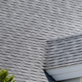 What is the average cost to put new shingles on a roof?